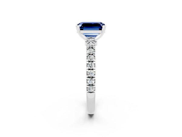 Silver Emerald Cut Solitaire Blue Sapphire with Pavé Band and Four-Prong Setting