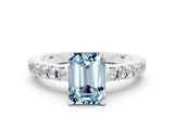 White gold Emerald Cut Solitaire Diamond with Pavé Band and Four-Prong Setting