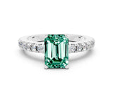 White gold Emerald Cut Solitaire Diamond with Pavé Band and Four-Prong Setting