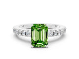 White gold Emerald Cut Solitaire Diamond with Pavé Band and Four-Prong Setting
