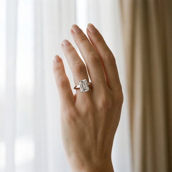 White gold Emerald Cut Solitaire Engagement Ring with Flat Band and Four-Prong Setting