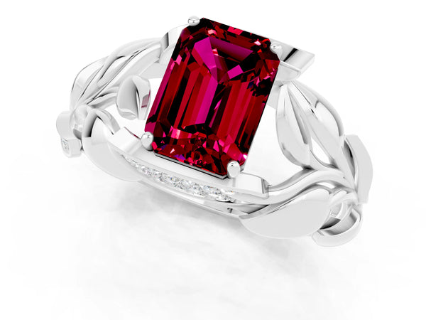 Platinum Emerald Cut Garnet Leaf-Inspired Engagement Ring with Round Accents and Prong Setting