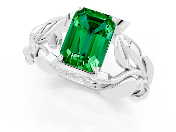 Silver Emerald Cut Emerald Leaf-Inspired Engagement Ring with Round Accents and Prong Setting