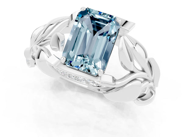 White gold Emerald Cut Aquamarine Leaf-Inspired Engagement Ring with Round Accents and Prong Setting