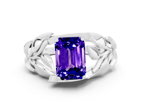 White gold Emerald Cut Tanzanite Leaf-Inspired Engagement Ring with Round Accents and Prong Setting
