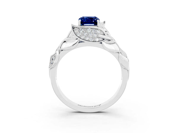 Platinum Emerald Cut Blue Sapphire Leaf-Inspired Engagement Ring with Round Accents and Prong Setting