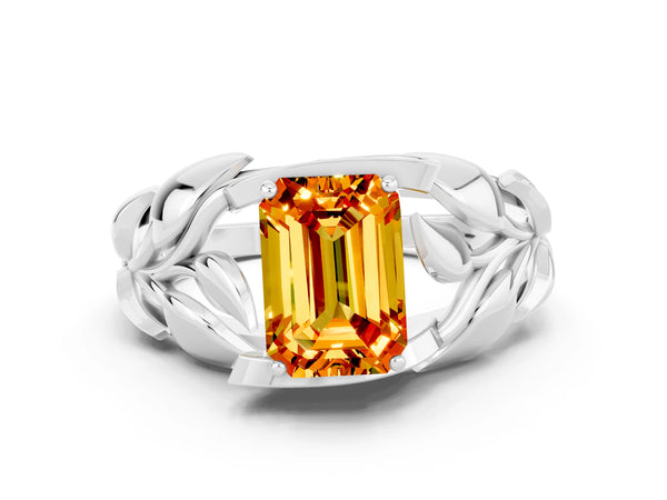 Platinum Emerald Cut Citrine Leaf-Inspired Engagement Ring with Round Accents and Prong Setting