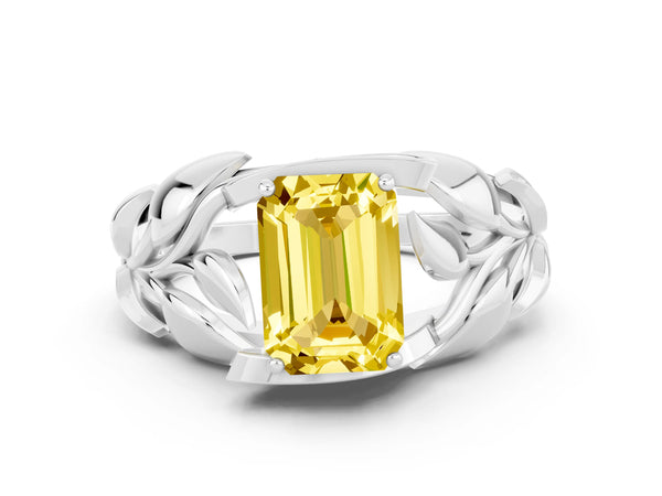White gold Emerald Cut Yellow Sapphire Leaf-Inspired Engagement Ring with Round Accents and Prong Setting