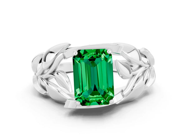 White gold Emerald Cut Emerald Leaf-Inspired Engagement Ring with Round Accents and Prong Setting