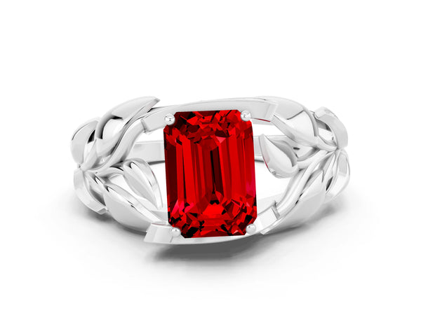 Silver Emerald Cut Ruby Leaf-Inspired Engagement Ring with Round Accents and Prong Setting