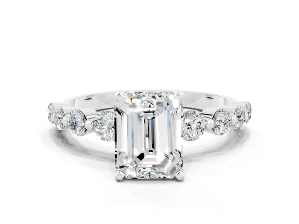 Platinum Emerald Cut Solitaire Moissanite Ring with Pave Band and Four-Prong Setting