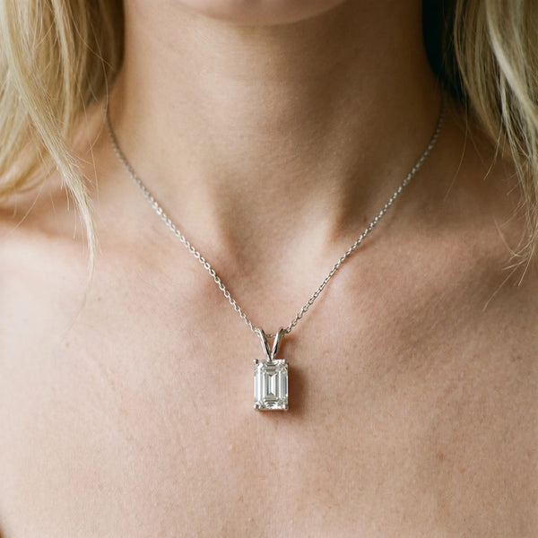 White gold Emerald Cut Solitaire Pendant with Four-Prong Setting