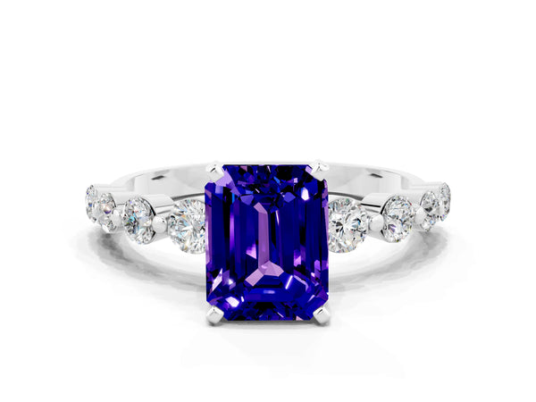 Platinum Emerald Cut Solitaire Tanzanite Ring with Pave Band and Four-Prong Setting