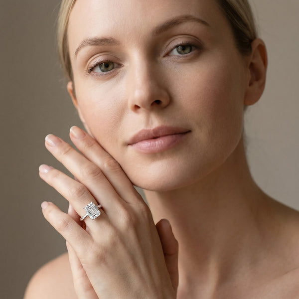 White gold Emerald Cut Solitaire Twisted Band with Four-Prong Setting
