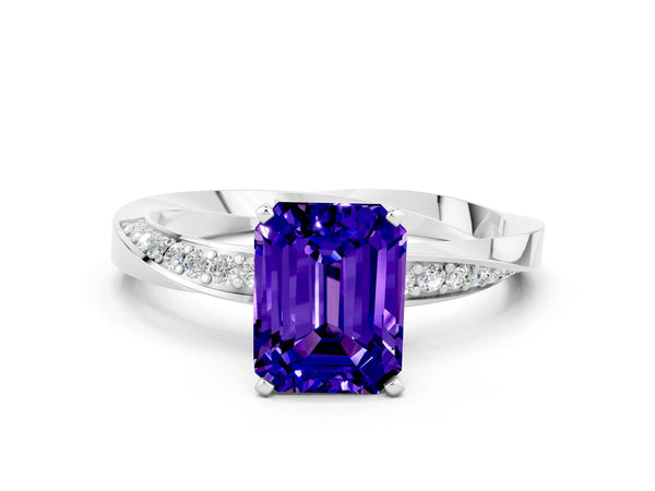 Silver Emerald Cut Tanzanite Engagement Ring with Side Stone Accents and Four-Prong Setting