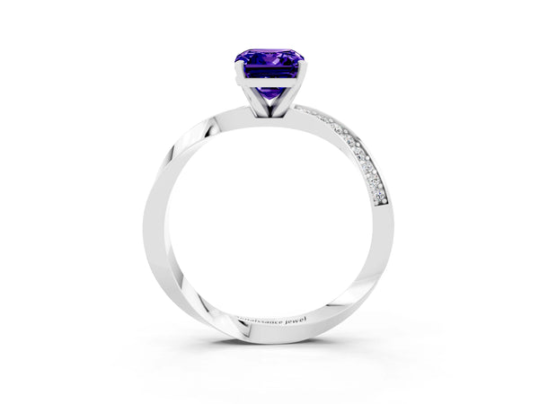 White gold Emerald Cut Tanzanite Engagement Ring with Side Stone Accents and Four-Prong Setting