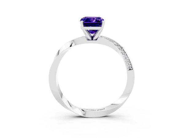White gold Emerald Cut Tanzanite Engagement Ring with Side Stone Accents and Four-Prong Setting