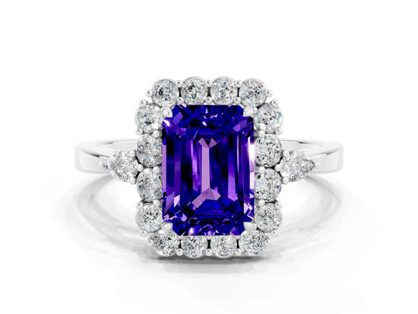 White gold Emerald Cut Tanzanite Halo Ring with Pear Side Stones and Prong Setting