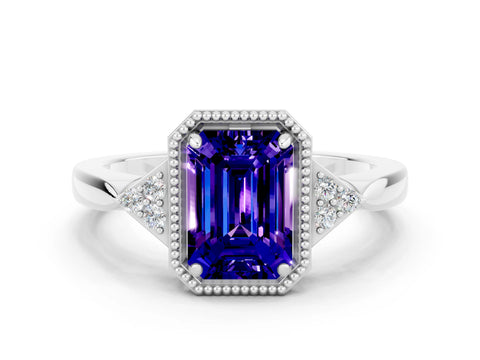 White gold Emerald Cut Tanzanite Halo Ring with Tapered Band and Four-Prong Setting