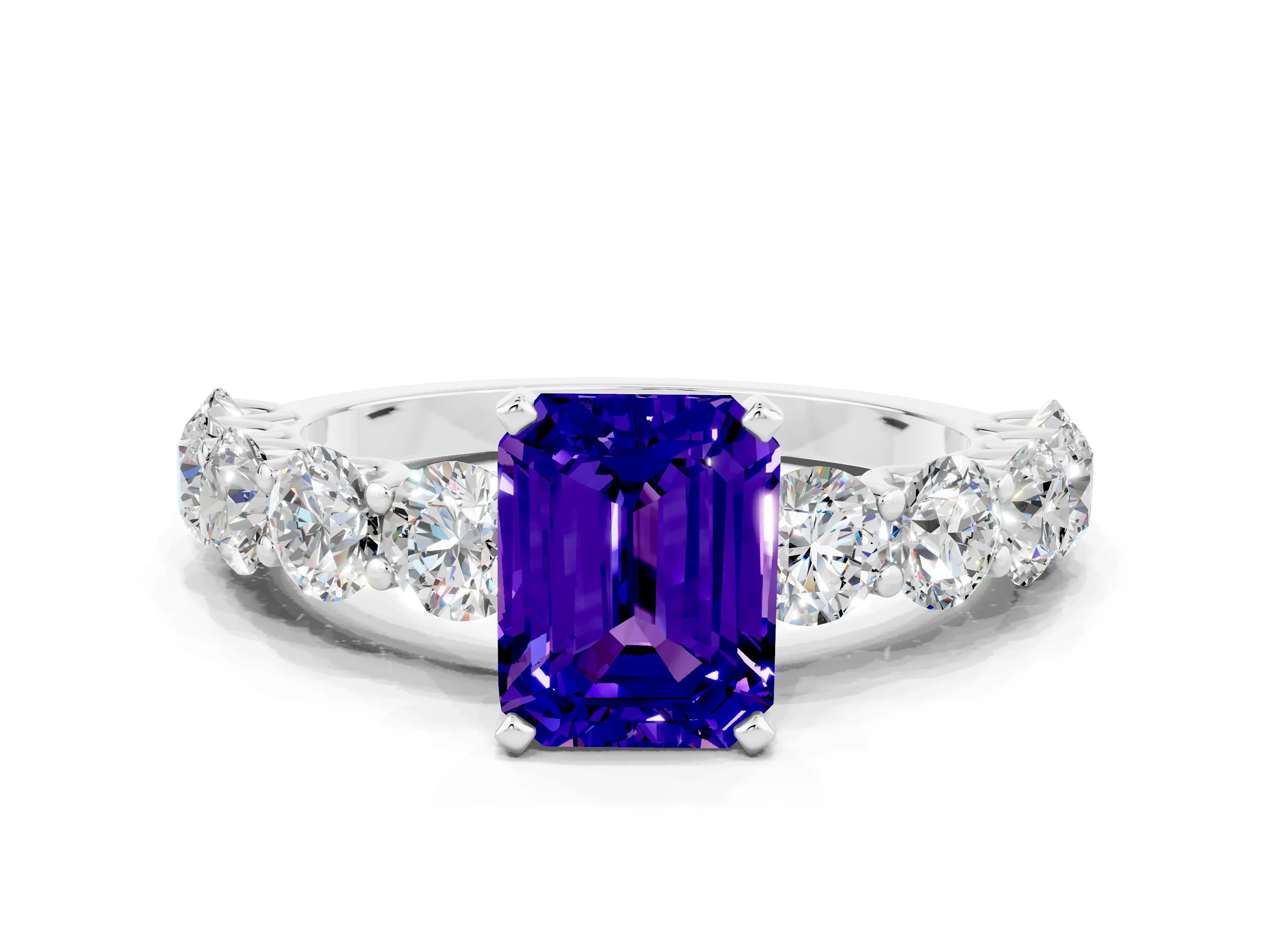 White gold Emerald Cut Tanzanite Prong Setting with Side Stones on a Pave Band