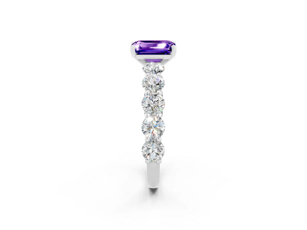 Platinum Emerald Cut Tanzanite Prong Setting with Side Stones on a Pave Band