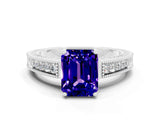 White gold Emerald Cut Tanzanite Ring with Milgrain Pavé Band and Four-Prong Setting_12