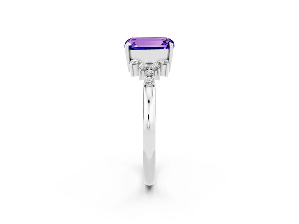 Platinum Emerald Cut Tanzanite Ring with Side Stones and Four-Prong Setting
