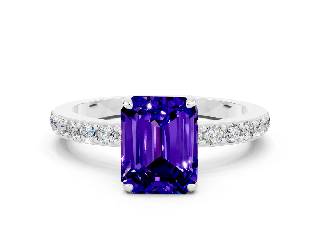 White gold Emerald Cut Tanzanite Solitaire Engagement Ring with Pavé Band and Four-Prong Setting