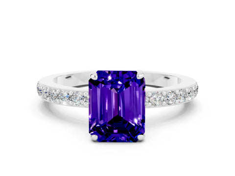 White gold Emerald Cut Tanzanite Solitaire Engagement Ring with Pavé Band and Four-Prong Setting