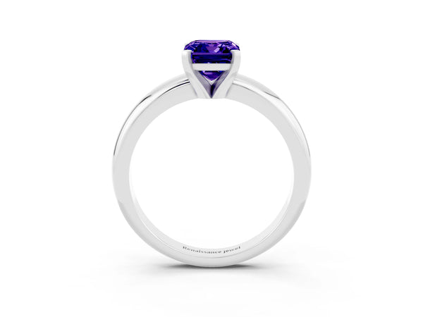 Platinum Emerald Cut Tanzanite Solitaire Engagement Ring with Round Band and Four-Prong Setting