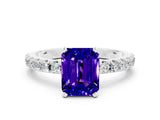 White gold Emerald Cut Tanzanite Solitaire Pavé Band with Four-Prong Setting