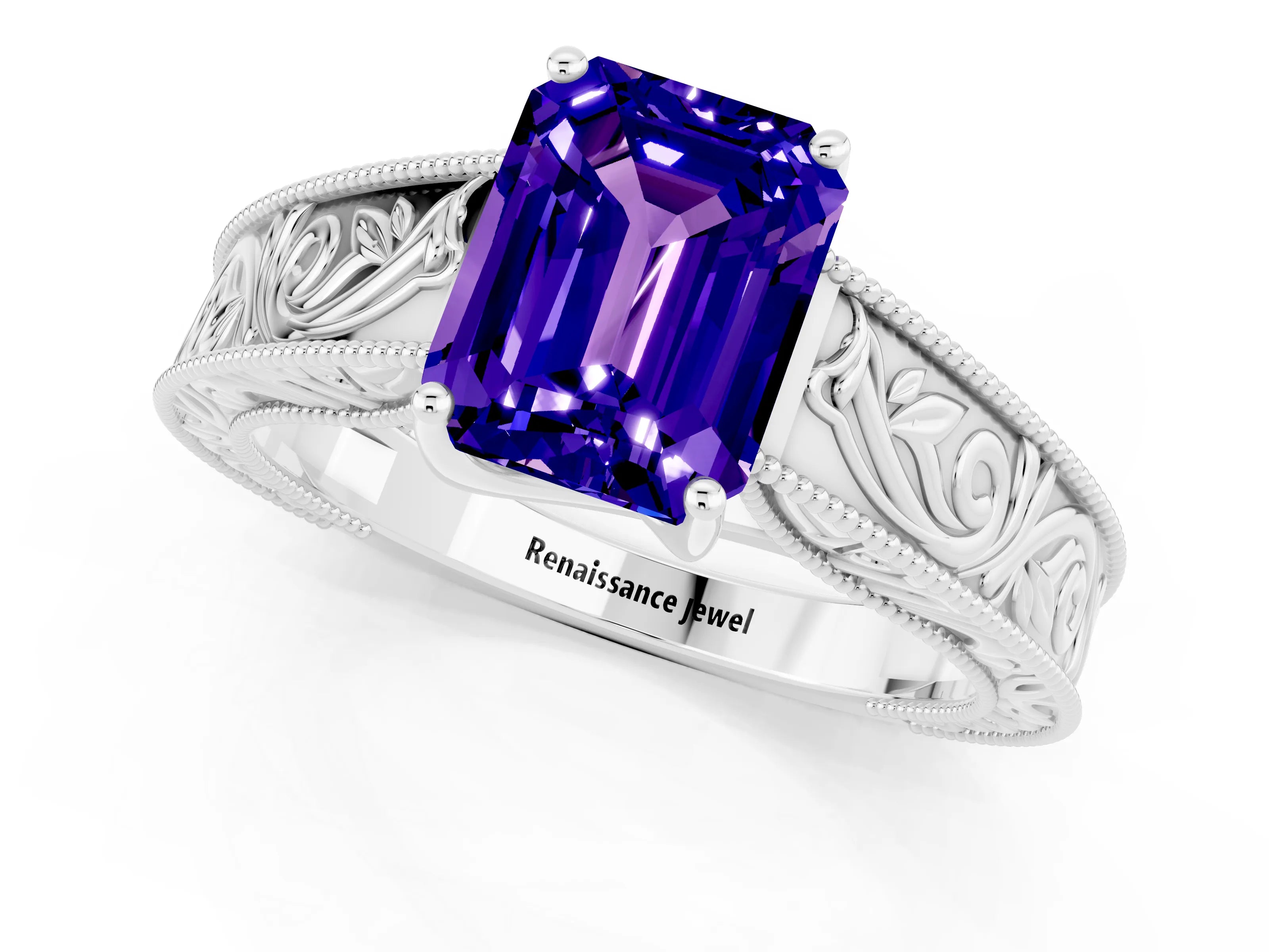 White gold Emerald Cut Tanzanite Solitaire Ring with Engraved Band and Four-Prong Setting_1