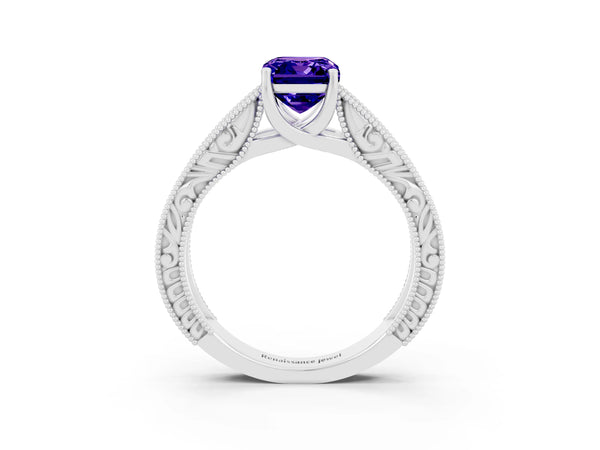Platinum Emerald Cut Tanzanite Solitaire Ring with Engraved Band and Four-Prong Setting