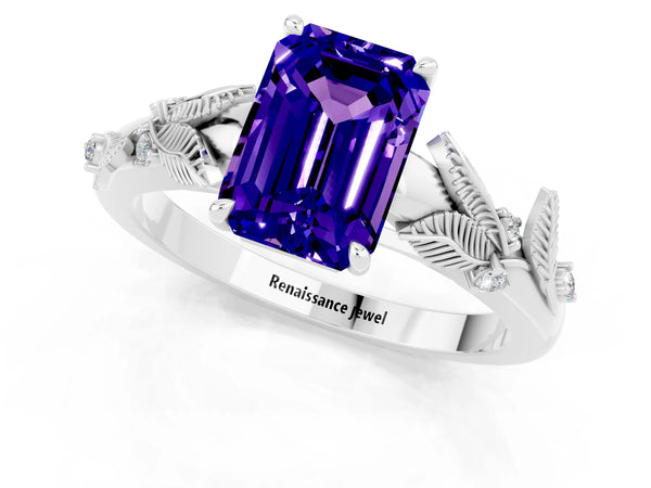 Silver Emerald Cut Tanzanite Solitaire Ring with Leaf Motif Band and Four-Prong Setting