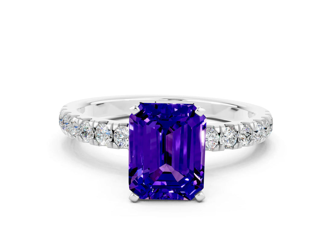 White gold Emerald Cut Tanzanite Solitaire Ring with Pavé Accents and Four-Prong Setting