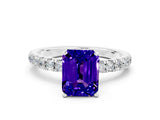 White gold Emerald Cut Tanzanite Solitaire Ring with Pavé Accents and Four-Prong Setting