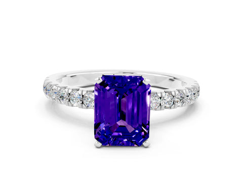 White gold Emerald Cut Tanzanite Solitaire Ring with Pavé Accents and Four-Prong Setting