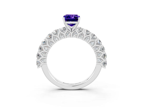 Platinum Emerald Cut Tanzanite Solitaire Ring with Shared Prong Pavé Band and Four-Prong Setting