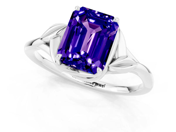 Platinum Emerald Cut Tanzanite Solitaire Ring with Twist Band and Four-Prong Setting
