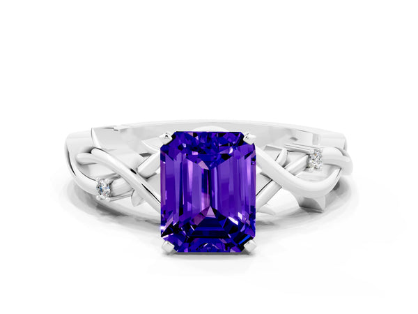 White gold Emerald Cut Tanzanite Solitaire Ring with Twisted Band and Prong Setting