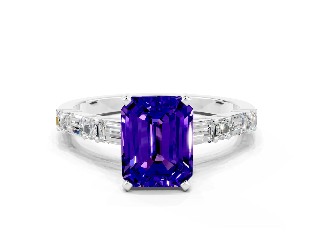 White gold Emerald Cut Tanzanite Solitaire with Side Baguettes and Channel Set Band