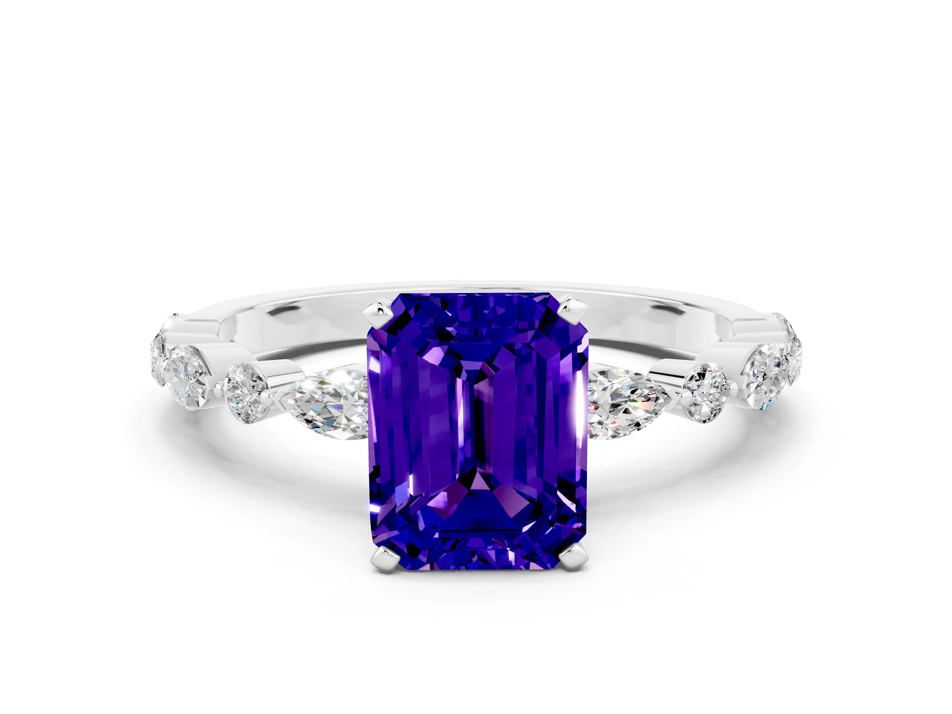 White gold Emerald Cut Tanzanite Solitaire with Side Stones on a Pavé Band and Four-Prong Setting