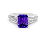 White gold Emerald Cut Tanzanite Split Shank Engagement Ring with Pavé Band