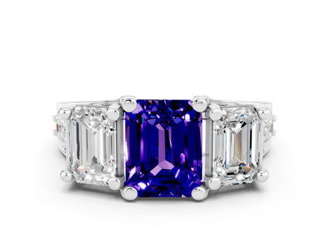 White gold Emerald Cut Tanzanite Three-Stone Ring with Channel Set Band and Four-Prong Setting