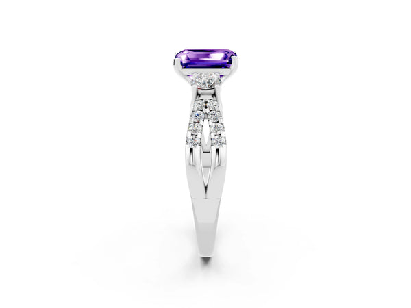 Platinum Emerald Cut Tanzanite Three-Stone Ring with Pavé Split Shank and Four-Prong Setting
