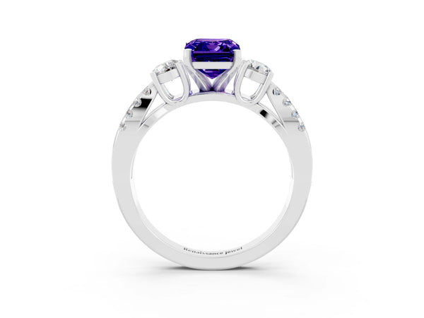 Platinum Emerald Cut Tanzanite Three-Stone Ring with Pavé Split Shank and Four-Prong Setting