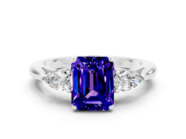 Silver Emerald Cut Tanzanite Three-Stone Ring with Pear  Side Stones and Prong Setting