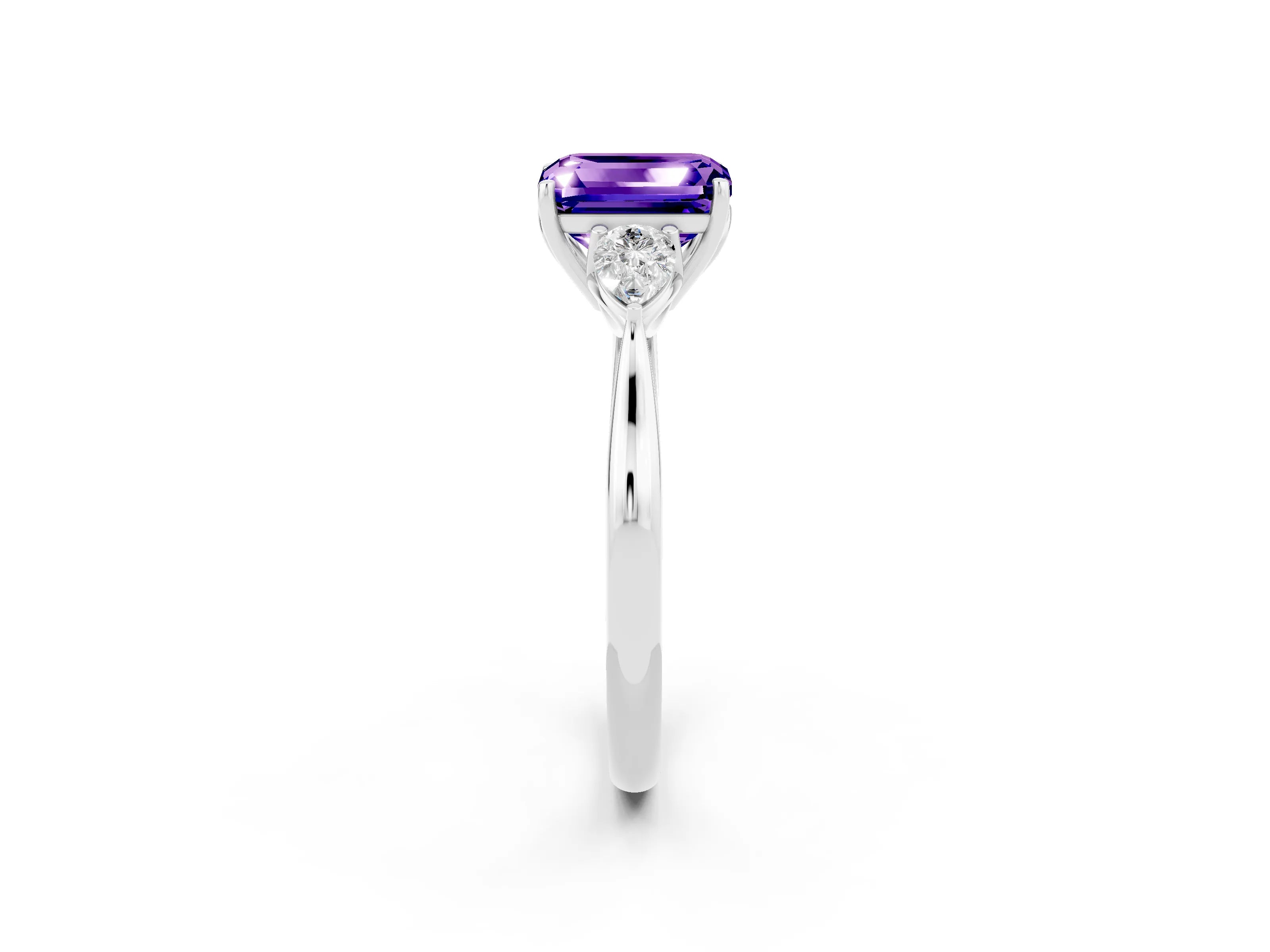White gold Emerald Cut Tanzanite Three-Stone Ring with Pear Side Stones and Four-Prong Setting_38