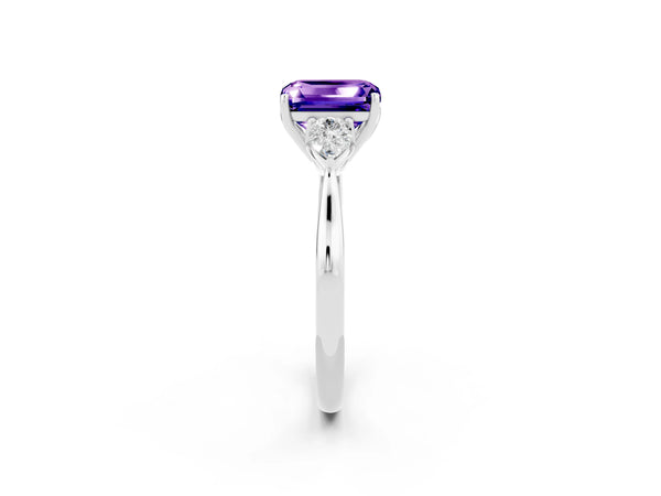 Platinum Emerald Cut Tanzanite Three-Stone Ring with Pear  Side Stones and Prong Setting
