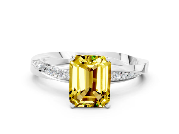 White gold Emerald Cut Yellow Sapphire Engagement Ring with Side Stone Accents and Four-Prong Setting